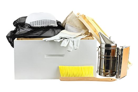 Beekeeping equipment isolated on a white background with clipping path included.