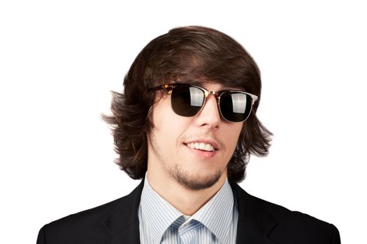 Young stilish man in sunglasses smiling. Isolated on a white