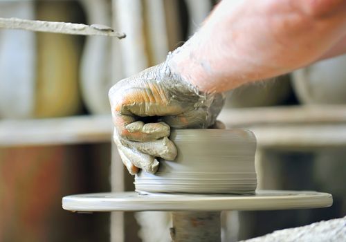 the creation of pottery on wheel