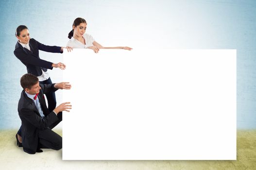 small group of people holding a blank banner, place for text