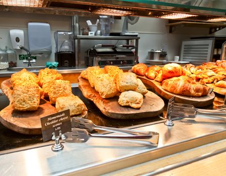 Cafeteria tray with homemade scones and croissants