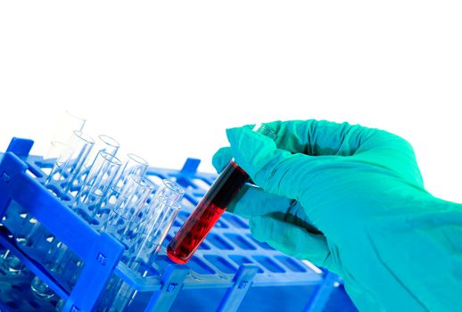A test tube with red liquid isolated on white