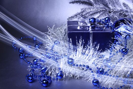 Magic christmas gift with silver and blue decoration