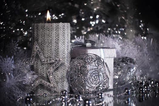 Silver christmas gift and different shiny decoration