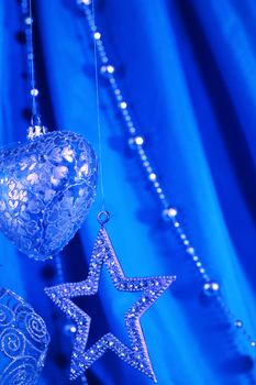 Blue christmas decoration on fabric background