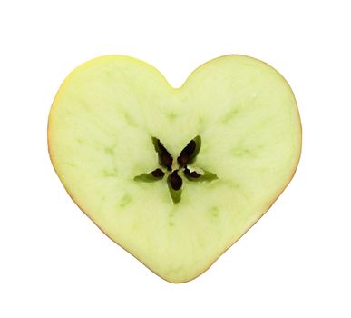 Red apple cross section shaped like heart on white background