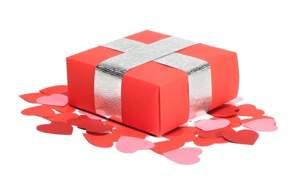 Valentines Day gift in red box and small hearts isolated on white