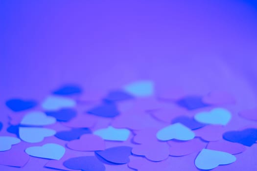 Valentines day blue background with many paper hearts