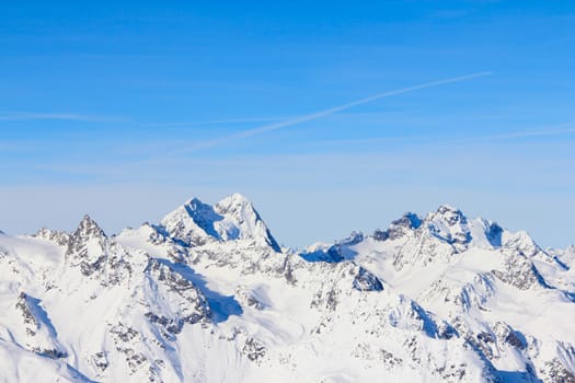 Hight mountains under blue sky beautiful winter panorama