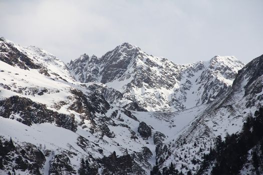 Winter alpine mountains covered with snow