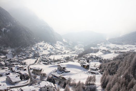 Panoramic view on winter Solden between mountains, Austria