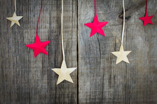 Christmas Star Decoration on wooden textured background
