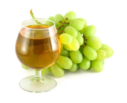 Grape juice in wine glass with grapes isolated on white