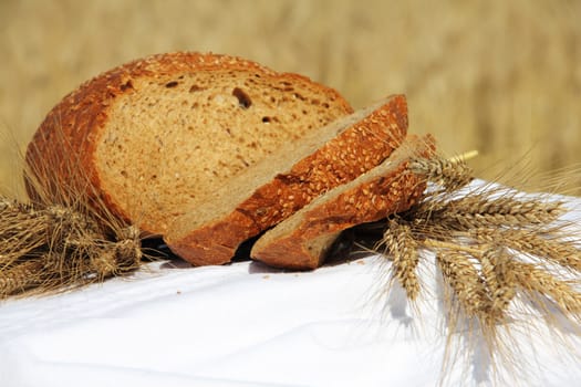 Bread and wheat outdoors natural healthy food concept