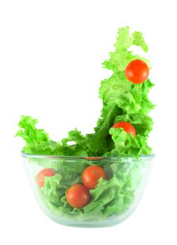  Light lettuce and cherry tomatoes salad in transparent bowl isolated on white lightness concept