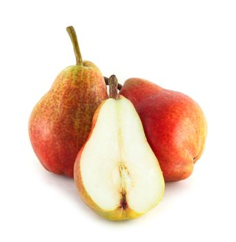 Two and half colorful pears isolated on white background
