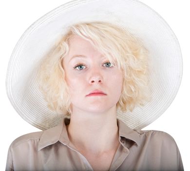 Close up of serious white woman in big hat