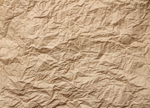 Old brown paper crumpled rough texture background