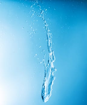 splashes of water on a blue background