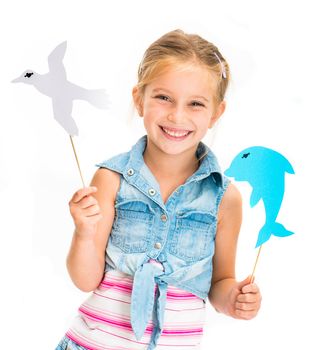 cute little girl with dolphin and gull