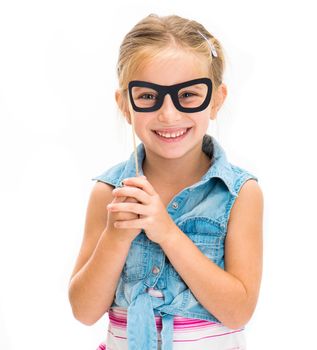 cute smiling little girl with fake glasses