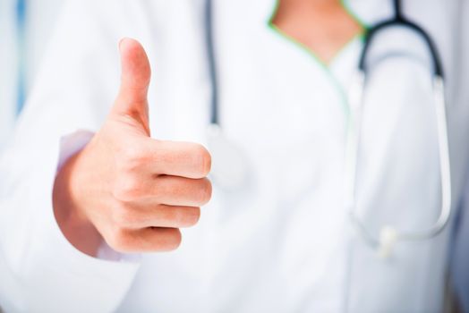 Doctor's hands with thumbs up