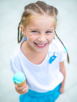 cute smiling little girl with ice cream
