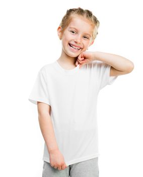 Cute little girl in tshirt isolated on a white background, studio shoot