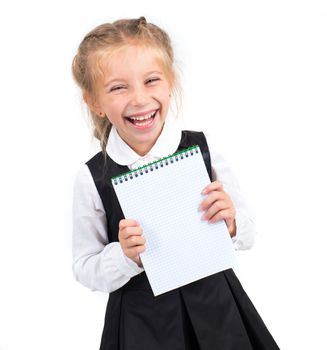 cute smiling schoolgirl with a white sheet of notebook
