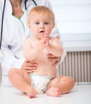 baby at the doctor pediatrician on office