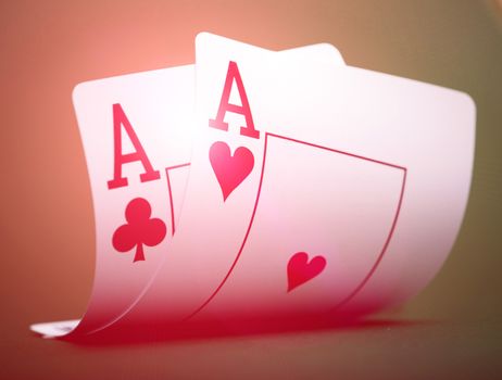 Two aces on a green table casino