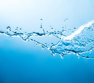 splashes of water on a blue background