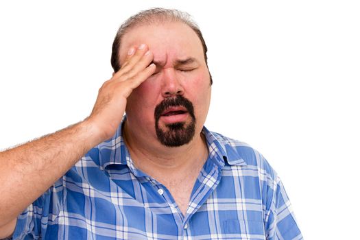 Portrait of a middle-aged man experiencing a headache, isolated on white background