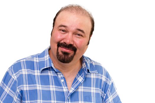 Overweight man with a goatee beard looking at the camera with an amused kindly expression isolated on white