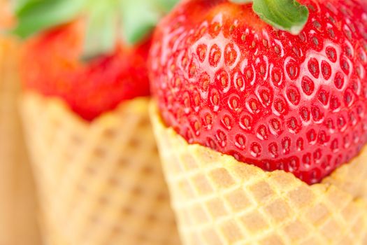 strawberry in a waffle cone closeup
