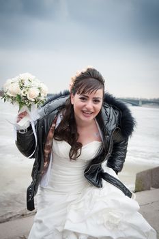 bride with a bouquet of winter