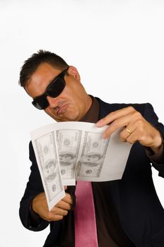Mafia looking type of guy forging dollar bills