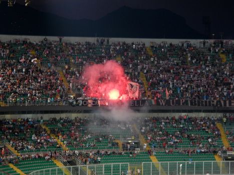 Fans of Palermo show their support during the Tim Cup 2013-2014 match between US Citta di Palermo and Hellas Verona at Stadio Renzo Barbera on August 17, 2013 in Palermo, Italy.
