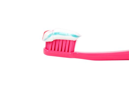 toothpaste on the toothbrush, isolated on white background