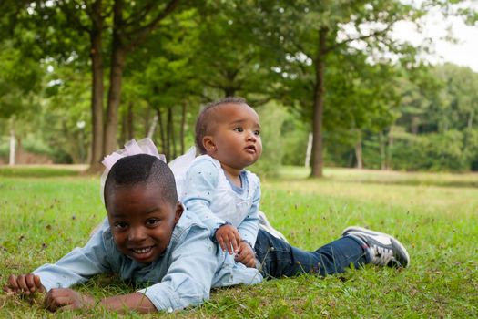 Happy little children are having a nice day in the park