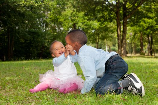 Happy little children are having a nice day in the park