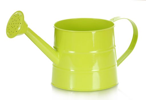 green watering can for the garden isolated on white background