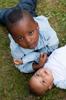 Happy little children are having a nice day in the park