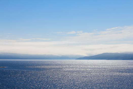 Summer panoramic view of the sea and mountain range in northern Norway