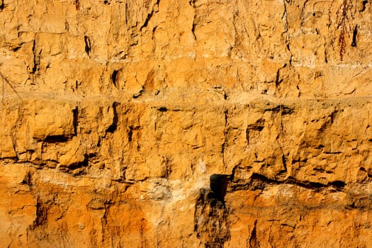 cliff of the brown clay