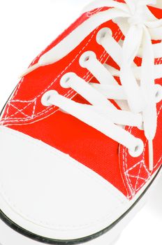 Trendy Red Gym Shoe closeup on white background