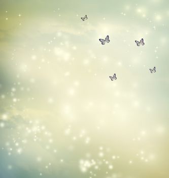 Small butterflies in a fantasy sky