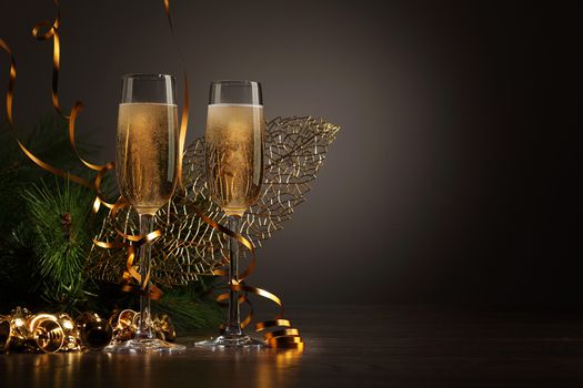 Two champagne glasses ready to bring in the New Year