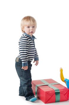 Little boy in striped clothes in studio