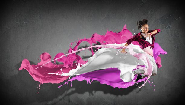 Modern style dancer jumping and paint splashes Illustration